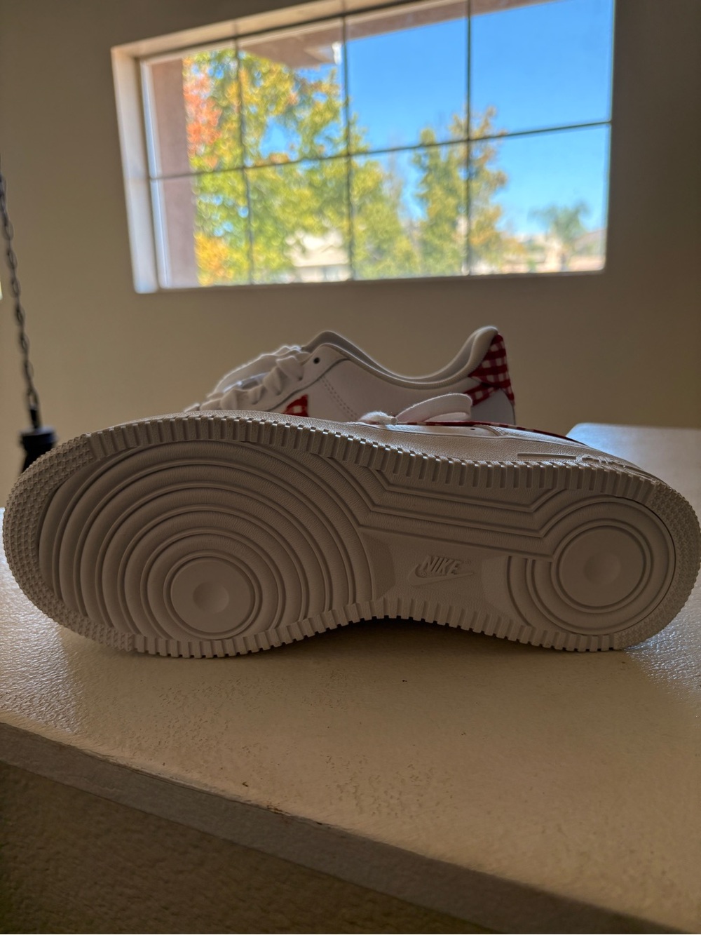 Nike White Low-Top Sneakers with Red Check Heel